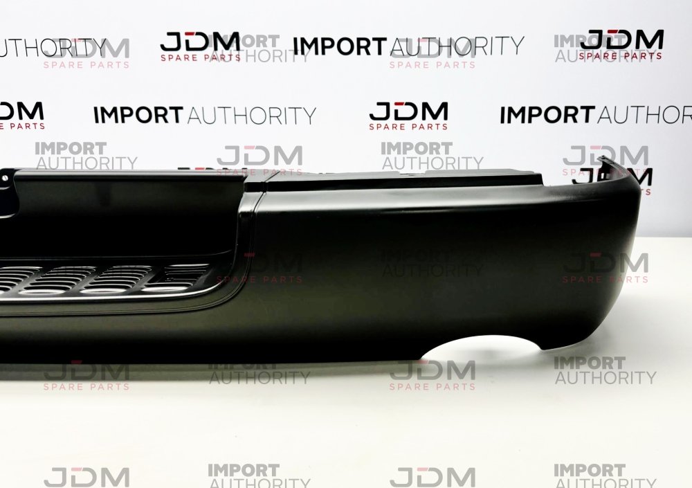 REAR BUMPER COVER - BRAND NEW GENUINE