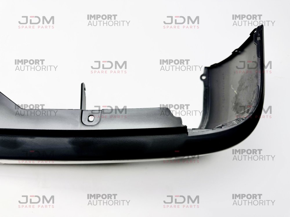 REAR BUMPER COVER - BRAND NEW GENUINE